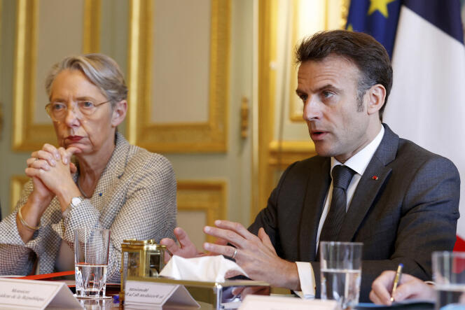 L'ex-première ministre Elisabeth Borne et le président français Emmanuel Macron.